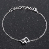 .1 Ct Rhodium Bracelet with Interlocking Floral Links - JGI