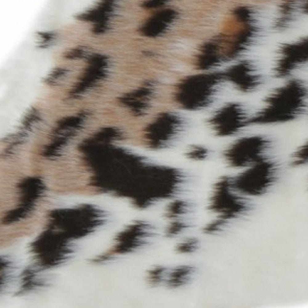 4' X 5' Ivory Black and Brown Faux Fur Leopard Print Area Rug