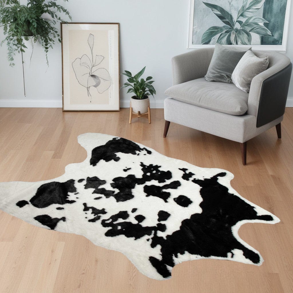 4' X 5' Black and White Faux Cowhide Animal Print Area Rug