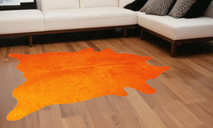 Alfombra de piel de vaca color naranja de 72" x 84"