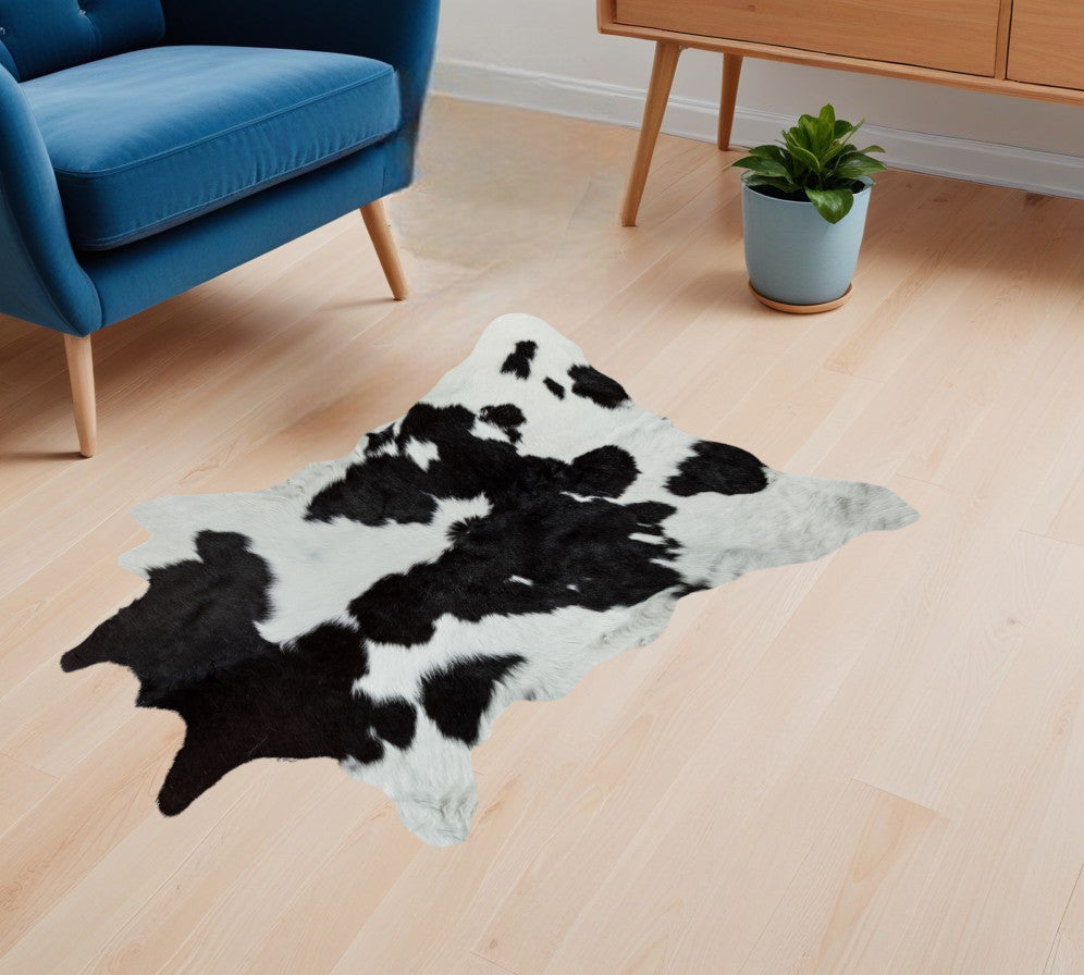 2' X 3' Black and White Cowhide Hand Woven Area Rug