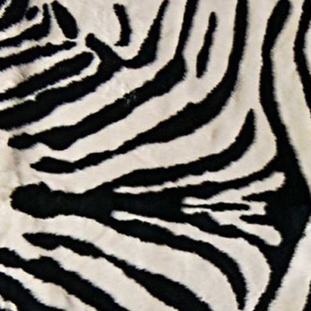 5' X 7' Black and White Faux Cowhide Zebra Print Area Rug - Homeroots