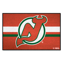 New Jersey Devils Starter Mat Accent Rug - 19in. x 30in. Uniform Alternate Design