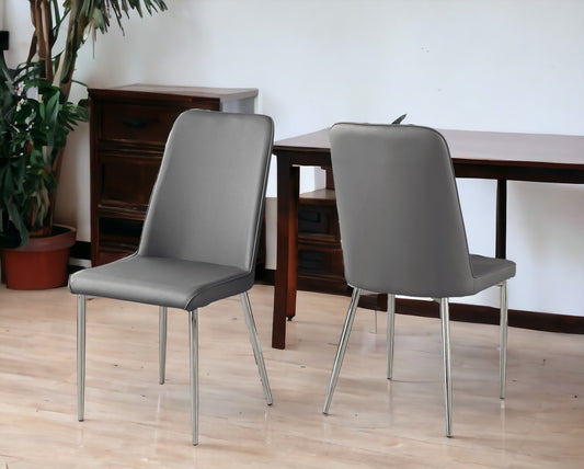 Set of Two Gray And Silver Upholstered Faux Leather Dining Side Chairs