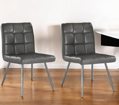 Set of Two Tufted Gray And Silver Upholstered Faux Leather Dining Side Chairs