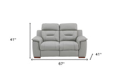 67" Gray And Brown Faux Leather Manual Reclining Loveseat