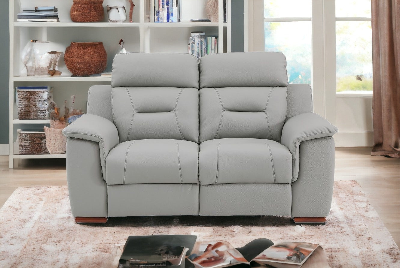 67" Gray And Brown Faux Leather Manual Reclining Loveseat