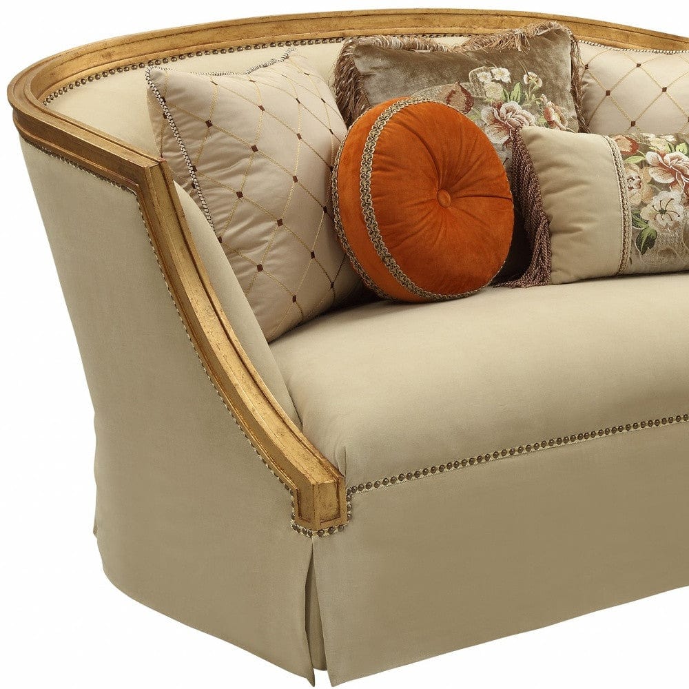 70" Tan And Gold Curved Loveseat and Toss Pillows - Homeroots