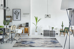 10' X 13' Grey Navy Blue Machine Woven Tropical Leaves Indoor Area Rug