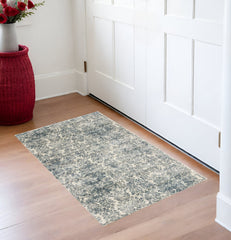 2' X 4' Ivory and Blue Damask Area Rug