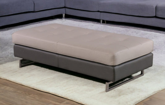 63" Taupe Faux Leather And Silver Ottoman