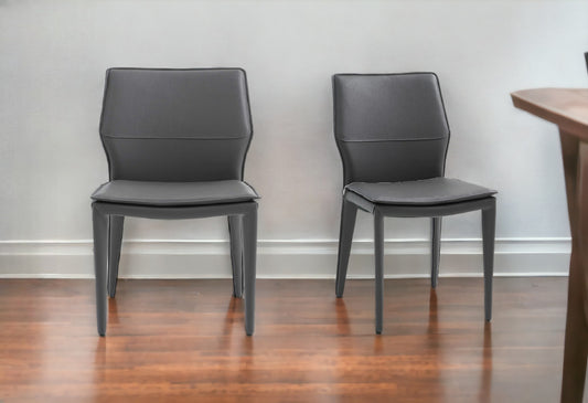 Set of Two Gray Slipcovered Upholstered Faux Leather Dining Side Chairs