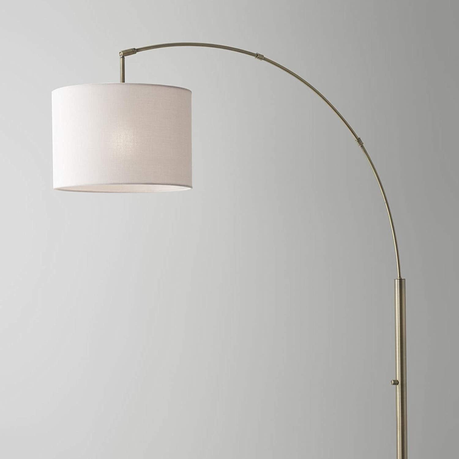 74" Brass Arc Floor Lamp With Off White Solid Color Drum Shade