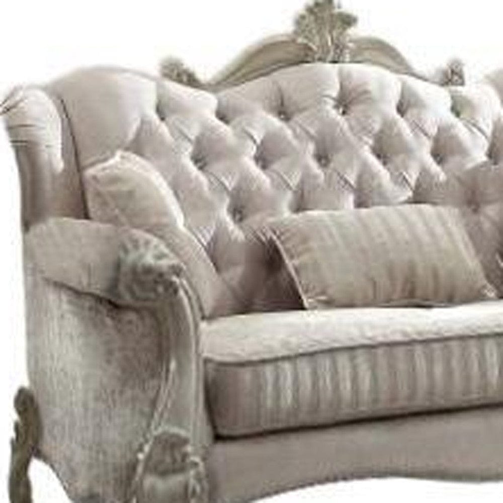 69" Ivory Chesterfield Loveseat and Toss Pillows - Homeroots