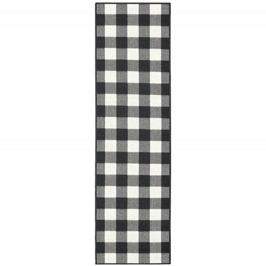 2' X 8' Black and Ivory Indoor Outdoor Area Rug