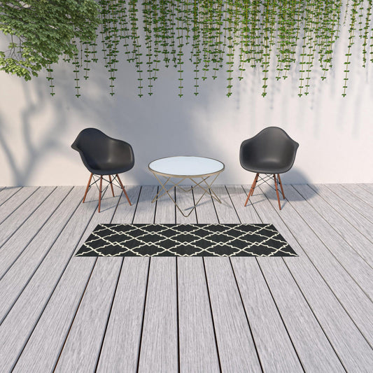 2' X 8' Black and Ivory Indoor Outdoor Area Rug - Homeroots