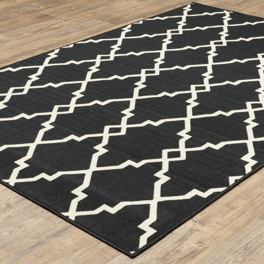 5' X 8' Black and Ivory Indoor Outdoor Area Rug - Homeroots