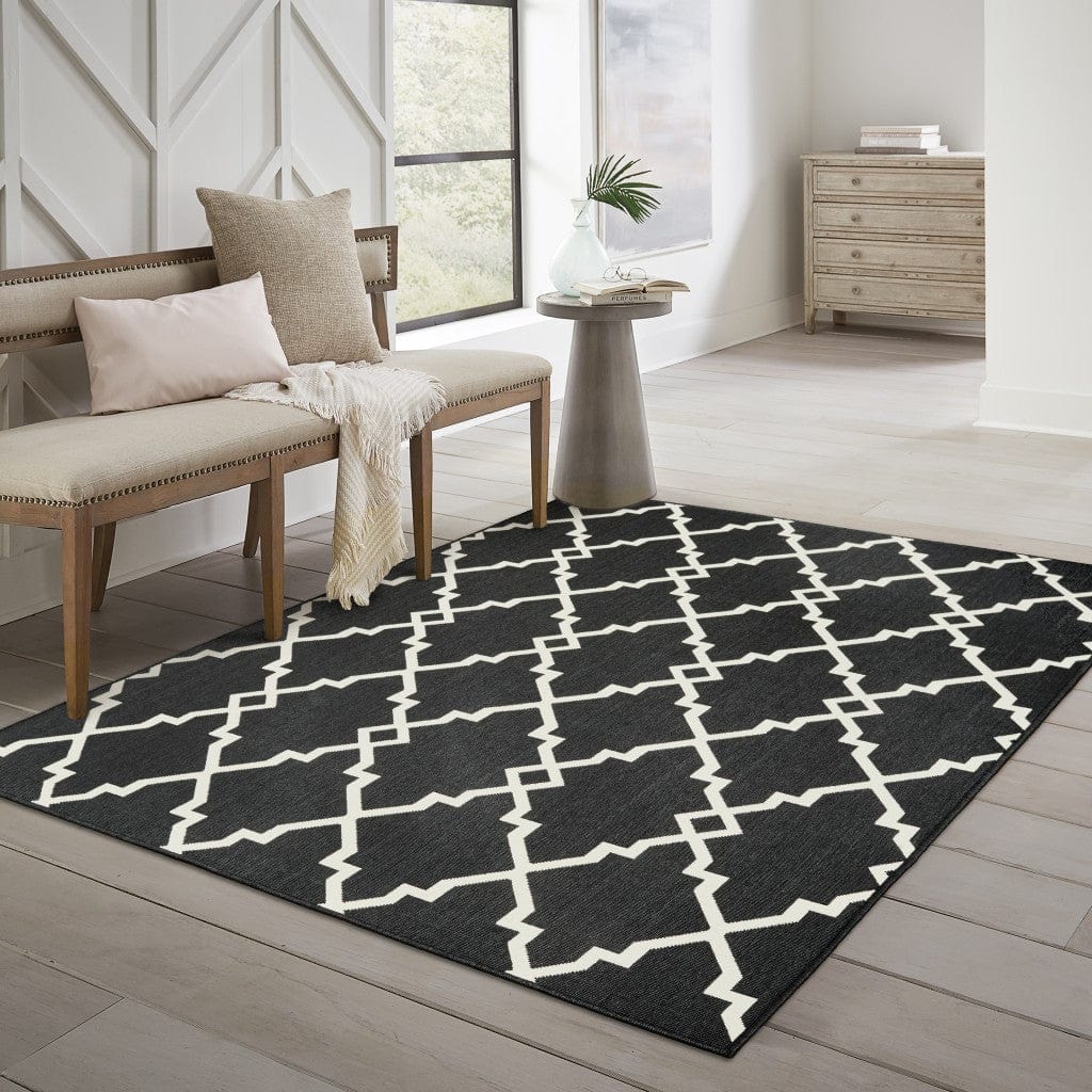 5' X 8' Black and Ivory Indoor Outdoor Area Rug - Homeroots