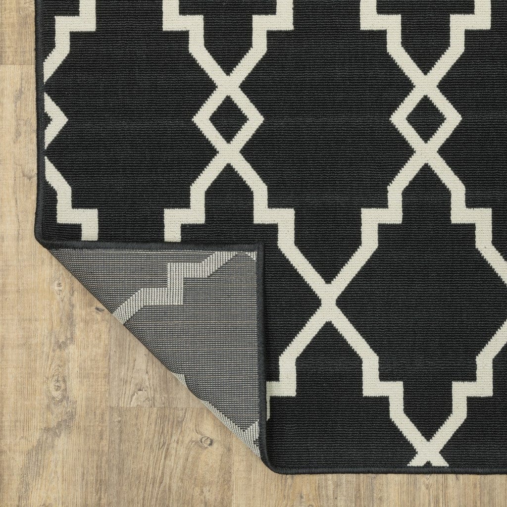 5' X 8' Black and Ivory Indoor Outdoor Area Rug - Homeroots