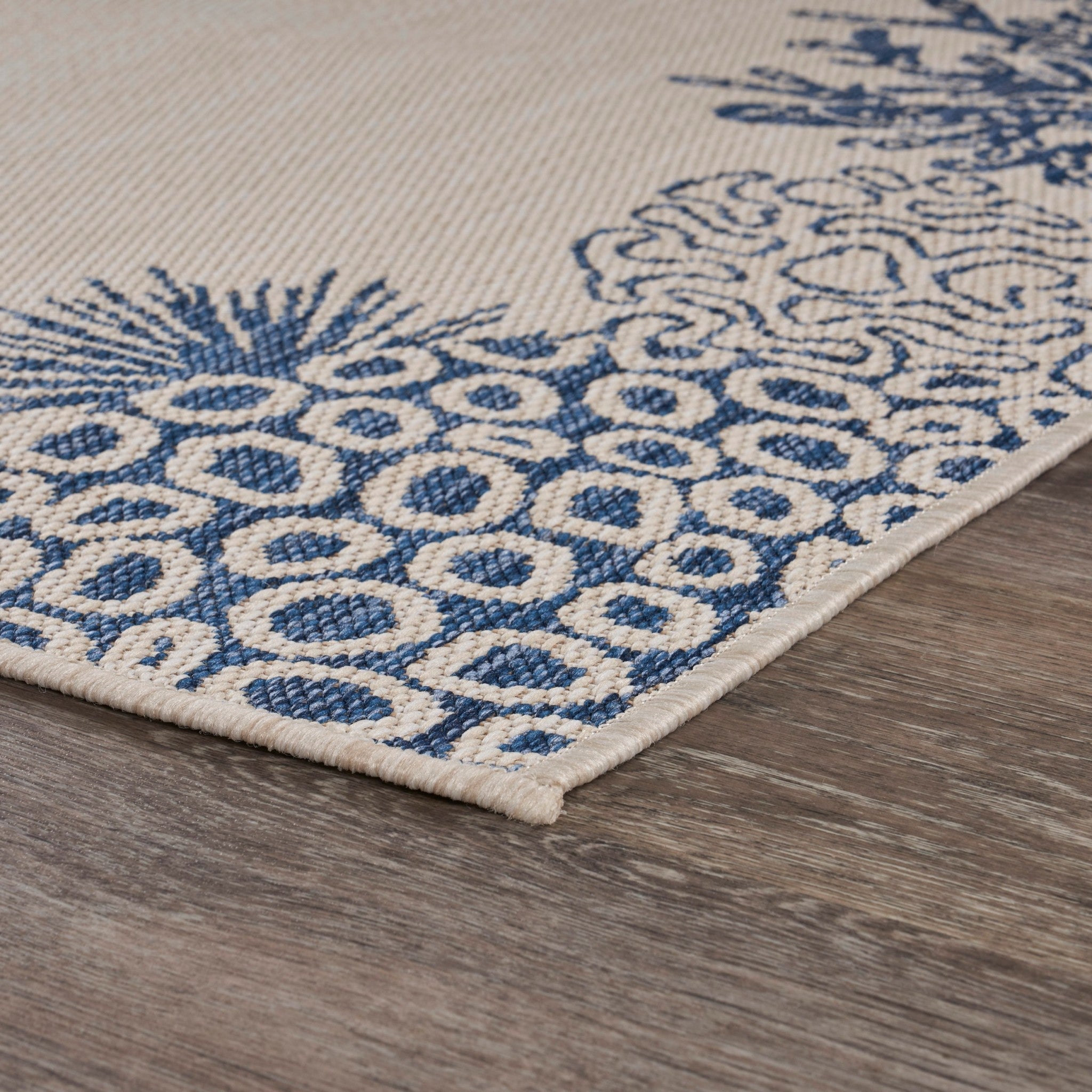 5' X 7' Beige and Blue Coral Stain Resistant Indoor Outdoor Area Rug