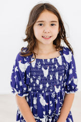 Feathered Friends Smocked Ruffle Dress