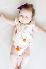 Tangerine Ruffle Cross Back Romper