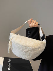 Bolso bandolera Sherpa con correa ajustable