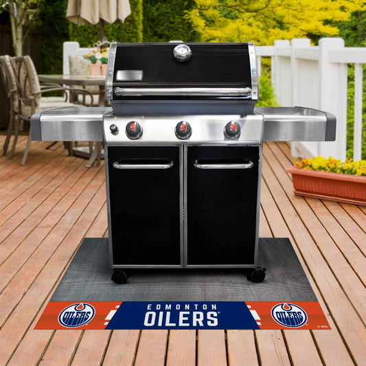 Alfombrilla de vinilo para parrilla de los Edmonton Oilers - 26 x 42 pulgadas.