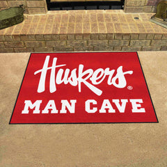 Nebraska Cornhuskers Man Cave All-Star Rug - 34 in. x 42.5 in., "Huskers" - Nebraska