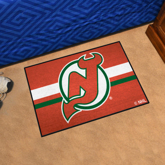 New Jersey Devils Starter Mat Accent Rug - 19in. x 30in. Uniform Alternate Design