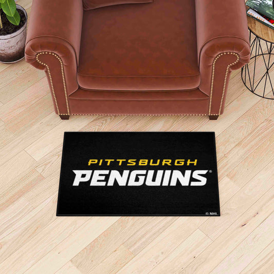 Alfombra decorativa de inicio de los Pittsburgh Penguins: 19 x 30 pulgadas.