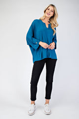 Celeste Full Size Notched Three-Quarter Sleeve Blouse - Trendsi