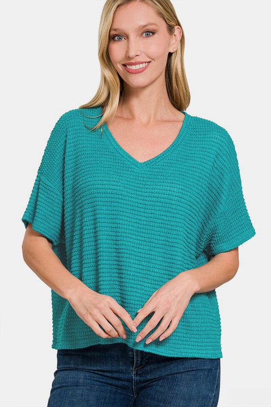 Blusa de punto jacquard de manga corta con hombros caídos de Zenana