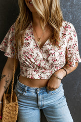 Printed Surplice Half Sleeve Blouse Trendsi