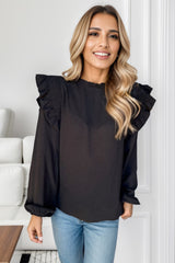 Blusa con cuello alto y mangas abullonadas y volantes