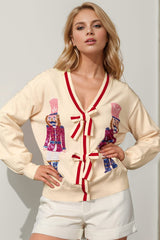 Double Take Full Size Nutcracker Sequin Bow Decor Cardigan - Trendsi