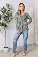 Heimish Full Size Floral Half Button Long Sleeve Blouse - Flyclothing LLC