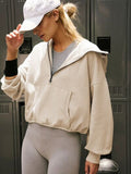 Half Zip Pocketed Dropped Shoulder Hoodie - Flyclothing LLC