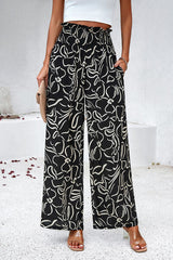 Smocked Printed Wide Leg Pants with Pockets - Flyclothing LLC