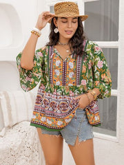 Plus Size Printed Tie Neck Peplum Blouse - Flyclothing LLC