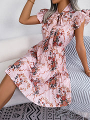 Pleated Floral Printed Tie Neck Knee Length Dress - Flyclothing LLC