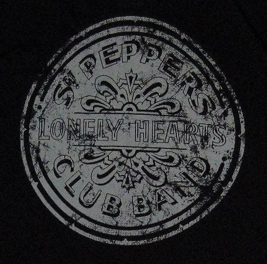 a close up of a clock on a black background 