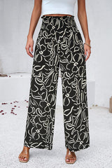 Smocked Printed Wide Leg Pants with Pockets - Flyclothing LLC