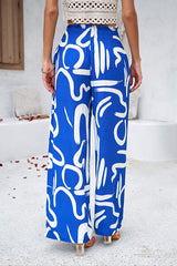 Smocked Printed Wide Leg Pants with Pockets - Flyclothing LLC