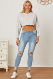 Round Neck Dropped Shoulder Cropped Sweatshirt - Trendsi