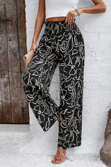 Smocked Printed Wide Leg Pants with Pockets - Flyclothing LLC