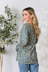 Heimish Full Size Floral Half Button Long Sleeve Blouse - Flyclothing LLC