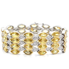 Alamode Gold+Rhodium Brass Bracelet with AAA Grade CZ in Topaz